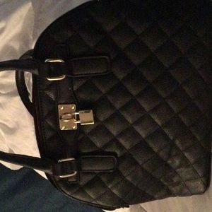 Black bag 10in height. 14in wide